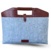 Grey felt document sleeve featuring a brown leather top handle and secure buttoned strap closure, offering a sophisticated look and reliable protection for documents or laptops.